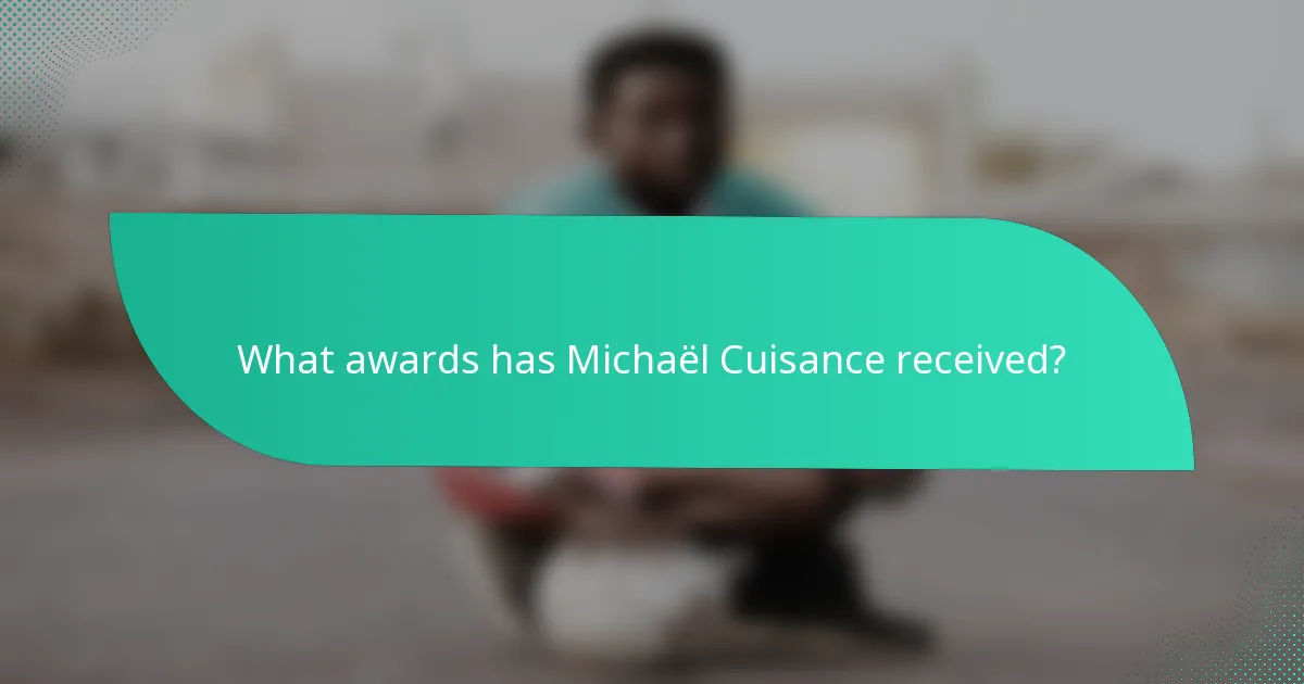 What awards has Michaël Cuisance received?